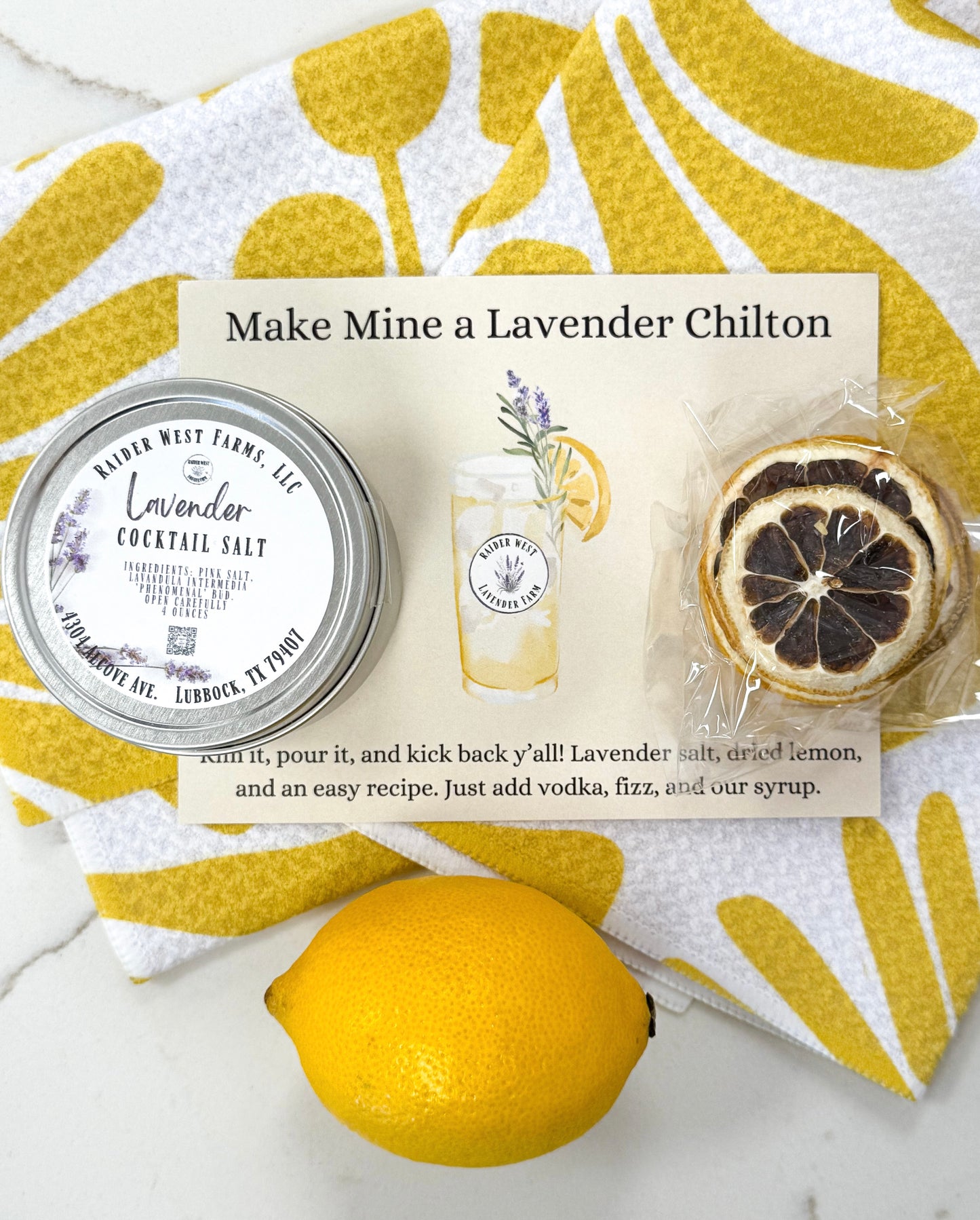 Lavender cocktail salt, dehydrated lemon wheels, and a recipe card. Raider West Farms, lavender chilton, Lubbock's cocktail, RWF, make mine a chilton.