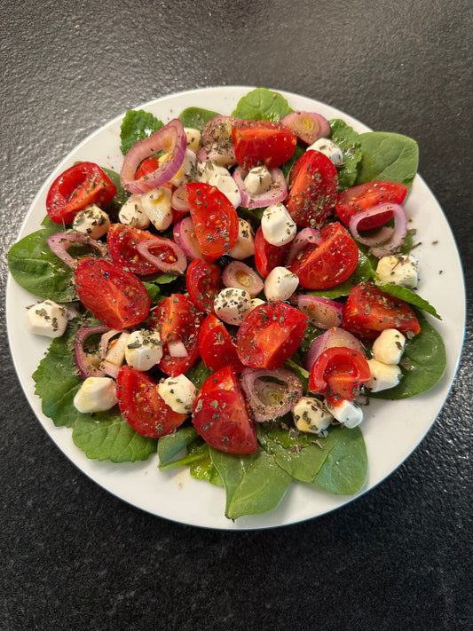 Juicy, sun-ripened tomatoes take center stage in this vibrant, summery salad. Lightly dressed in a refreshing vinaigrette, it's the perfect balance of sweet, tangy, and herbaceous that pairs beautifully with grilled meats, seafood, or crusty bread.